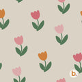 Spring Tulip seamless pattern: pink, rose and orange tulips with green leaves on a warm grey background.