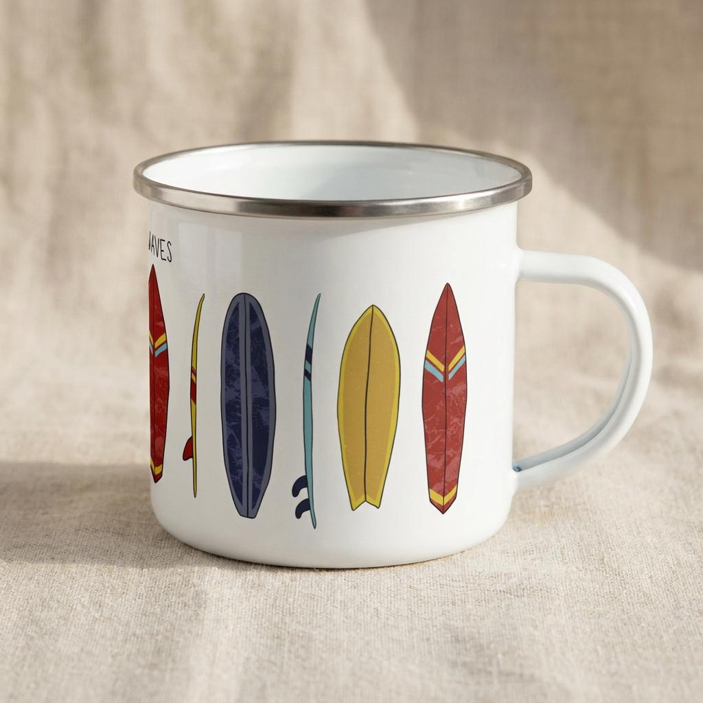 A white enamel mug with a silver rim and a handle, featuring a colourful graphic print of various surfboard shapes in red, yellow, blue, and dark grey, along with the partial text WAVES printed in black on the side of the mug.