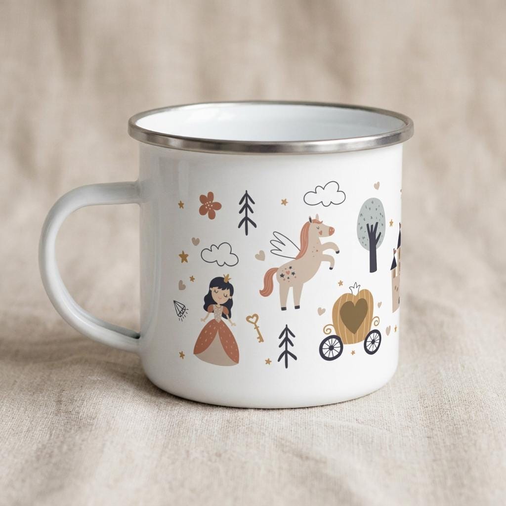 A white enamel mug with a silver rim and a handle, featuring a repeating pattern of a princess, a winged unicorn, a pumpkin carriage, trees, clouds, stars, and a key in muted earth tones of brown, tan, and grey on the exterior surface.