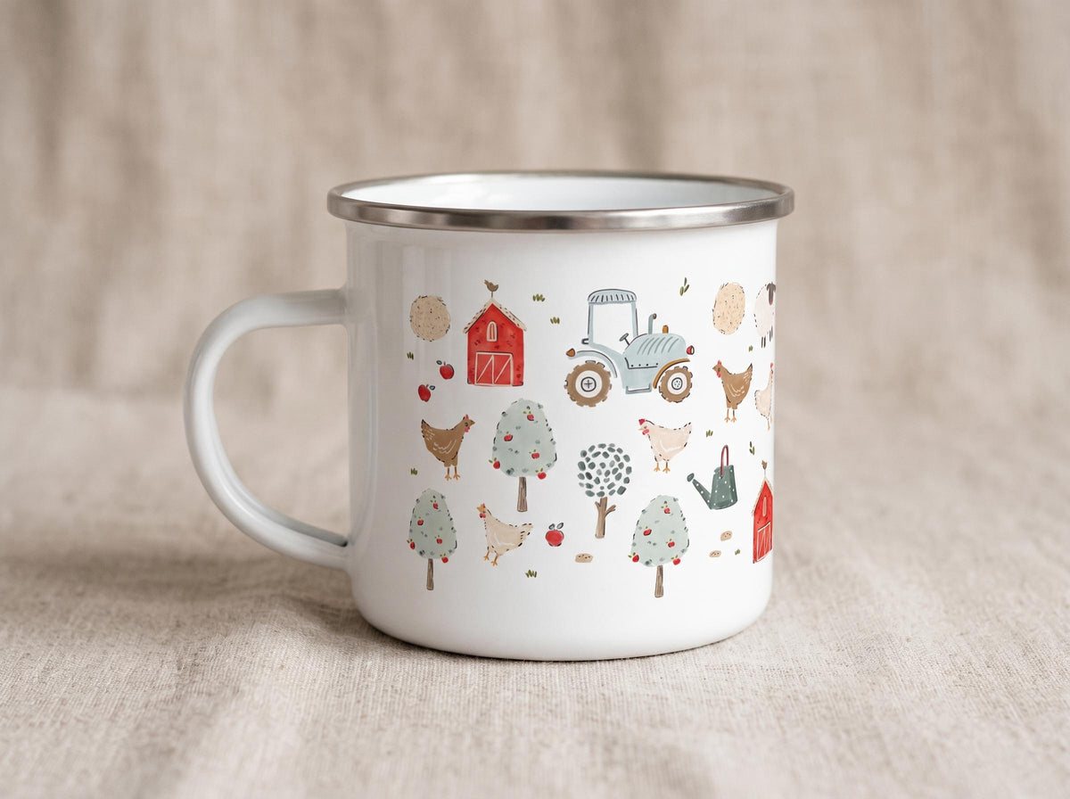 A white enamel mug featuring a colourful farm-themed pattern. The design includes illustrations of a red barn, a light blue tractor, various chickens, apple trees, and a watering can, all set against a clean white background.