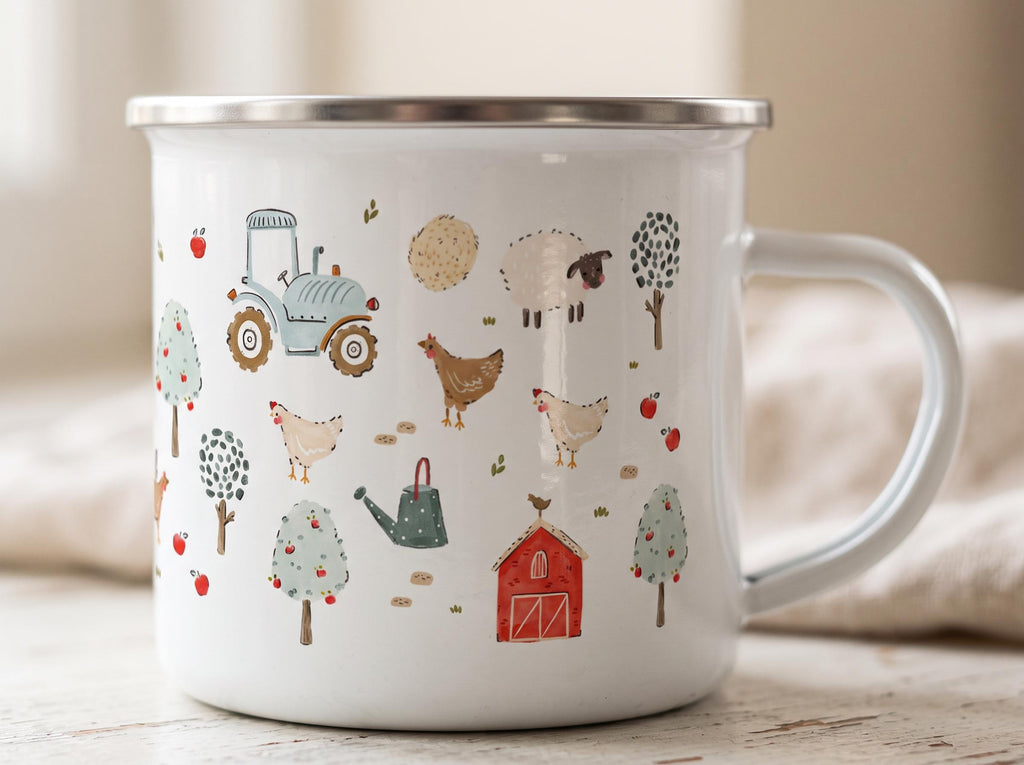 A white enamel mug with a silver rim featuring a farm-themed pattern. The design includes a light blue tractor, a red barn, a green watering can, sheep, chickens, and various trees with small red apples scattered across the surface.