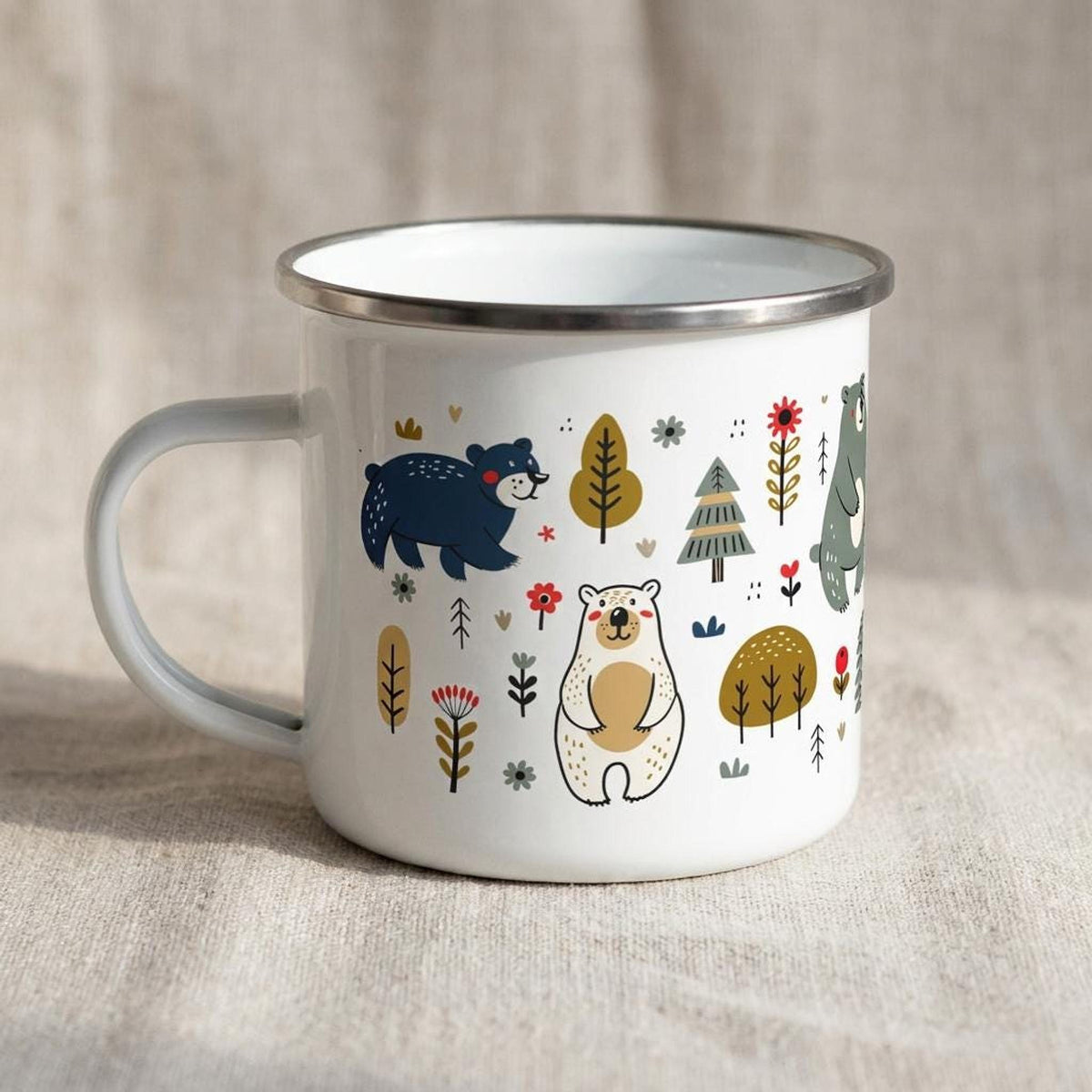 A side view of the white enamel mug highlighting its handle and the illustrated bear pattern.