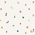 A light cream-coloured fabric featuring a repeating pattern of small, hand-drawn style fruits including strawberries, bananas, pineapples, apples, pears, and blueberries. The text b. is printed in orange in the bottom right corner.