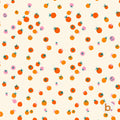 A repeating pattern on a cream background featuring small orange tomatoes with dark green stems and leaves, interspersed with tiny pink circular shapes and a small lowercase letter b in the bottom right corner.