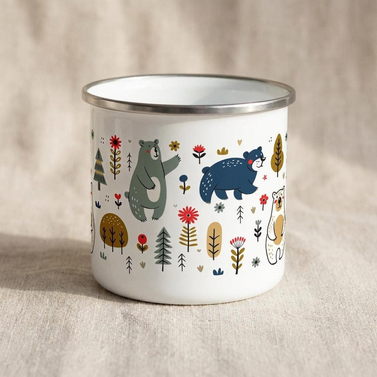 The white enamel mug is rotated to show another section of the forest animal pattern featuring bears and pine trees.
