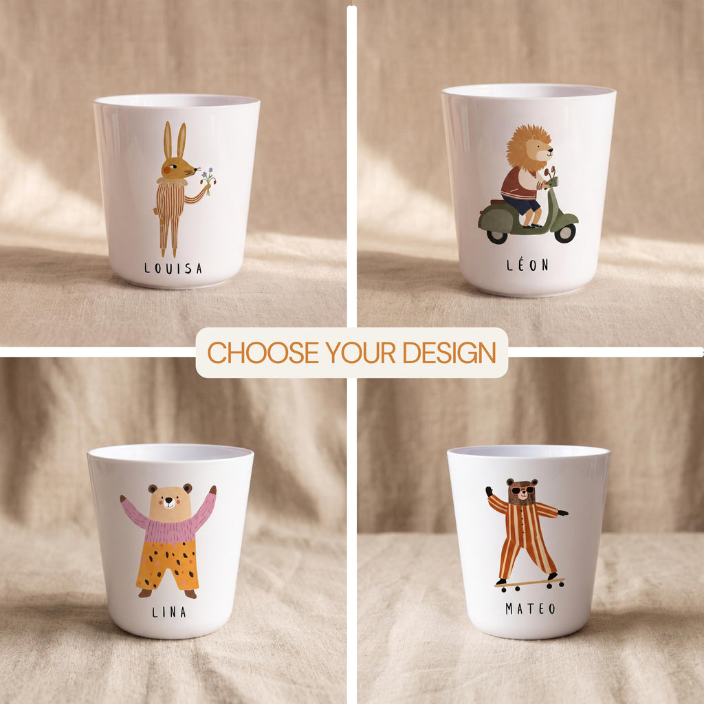 A grid of four white polymer cups displaying designs of a rabbit holding flowers, a lion on a scooter, a bear in patterned clothes, and a bear on a skateboard.