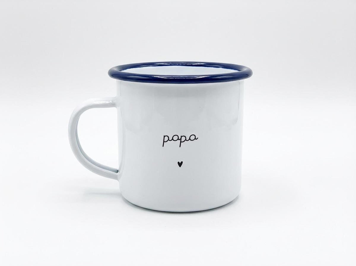 A single white enamel mug with a blue rim featuring the word papa and a small heart against a plain white background.