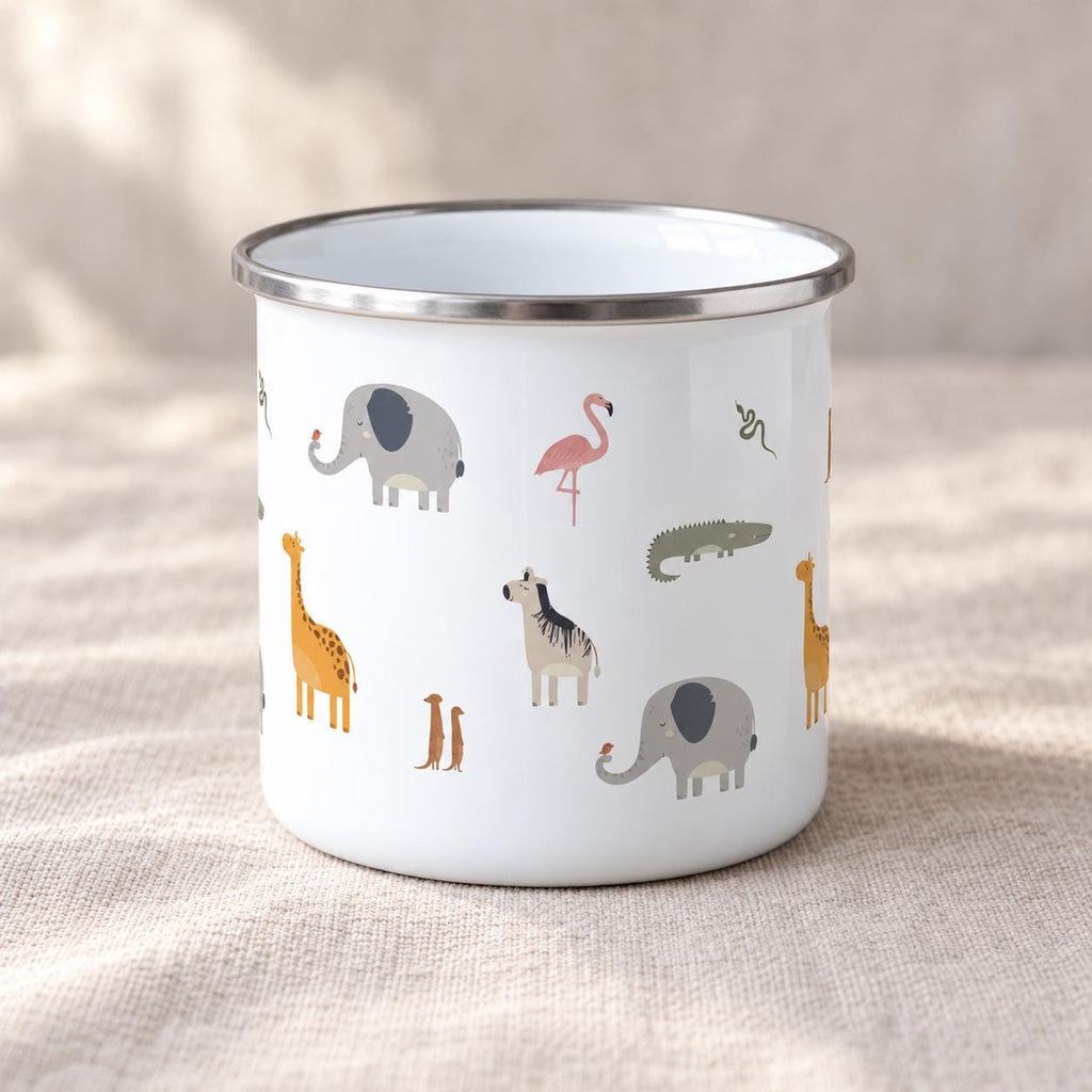 A white enamel mug with a silver-toned rim featuring a repeating pattern of various animals including a grey elephant, a pink flamingo, a yellow giraffe, a zebra, a crocodile, a snake, and a meerkat printed across the exterior surface.