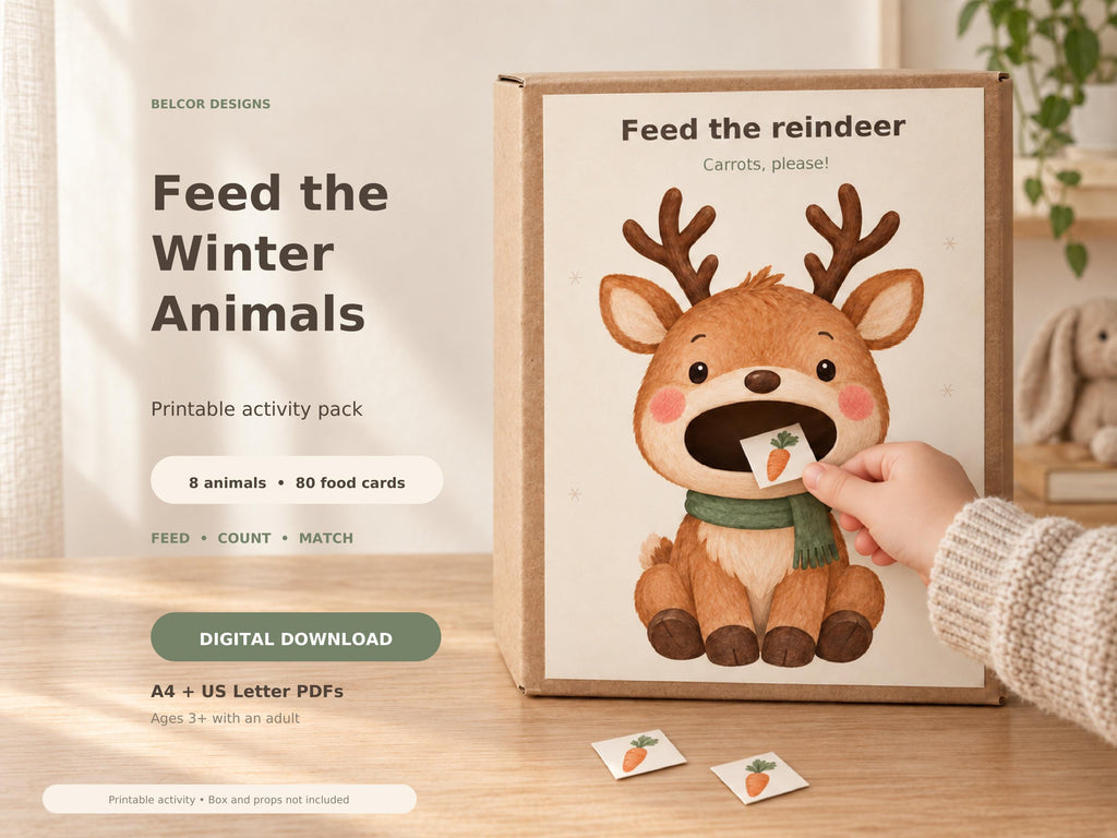 A child posts a small paper carrot card into the mouth of a reindeer feeding activity mounted on a cardboard box. Text states printable activity pack, eight animals and 80 food cards.