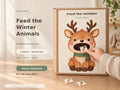 A child posts a small paper carrot card into the mouth of a reindeer feeding activity mounted on a cardboard box. Text states printable activity pack, eight animals and 80 food cards.