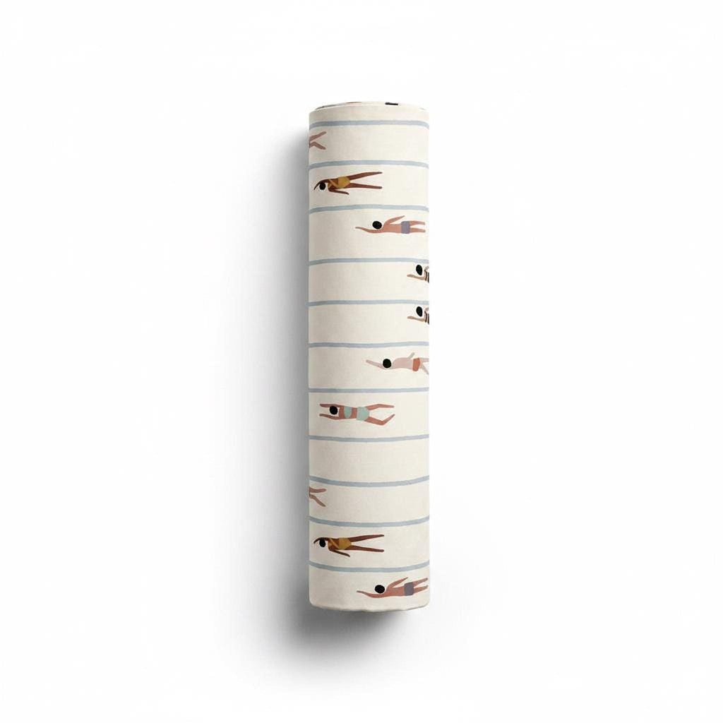A rolled bolt of fabric patterned with an illustrated swimmer and lane line design.