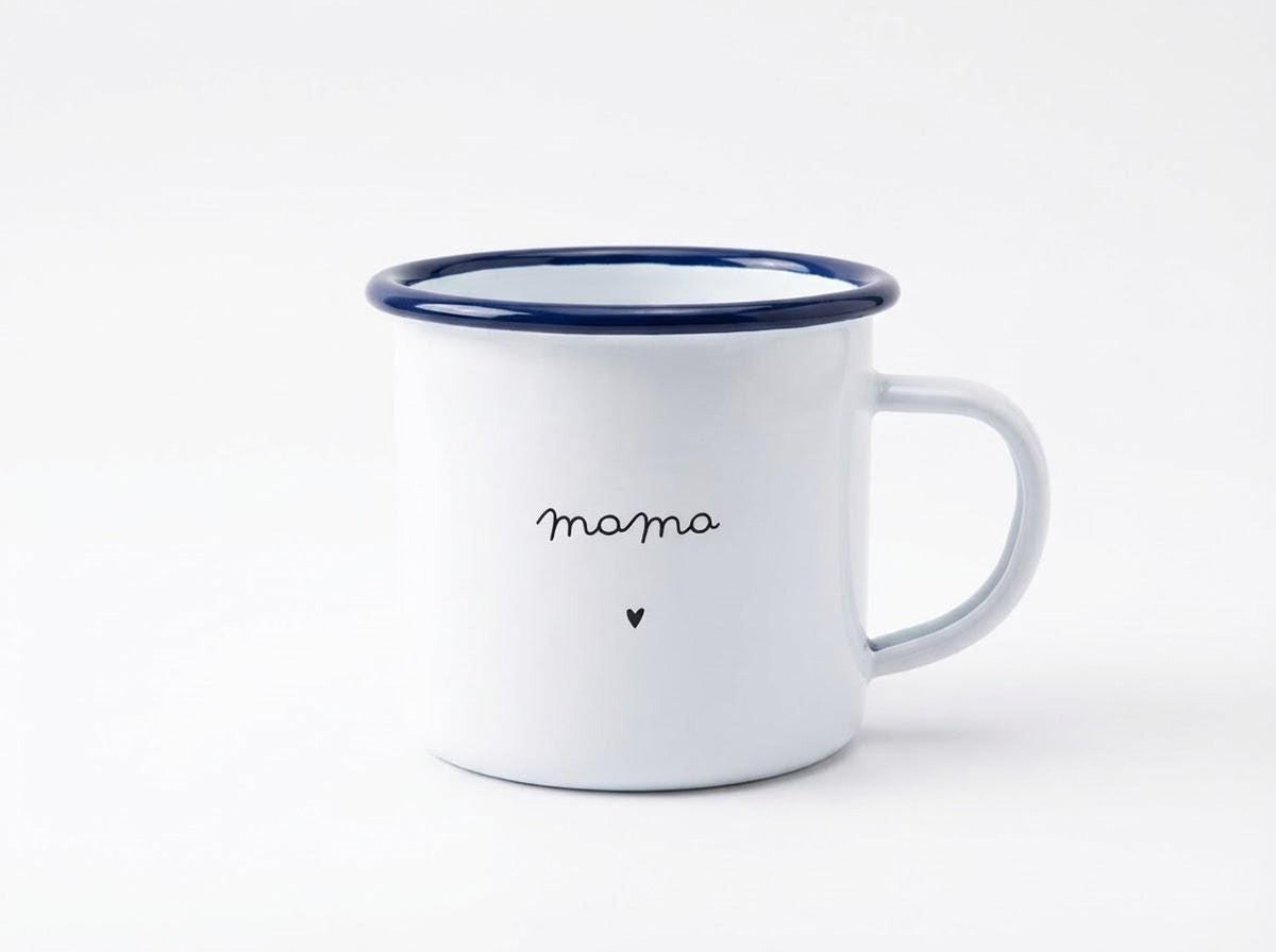 A single white enamel mug with a blue rim featuring the word mama and a small heart against a plain white background.